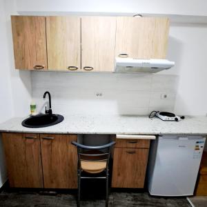 Η κουζίνα ή μικρή κουζίνα στο Apartament spatios - zona UTA