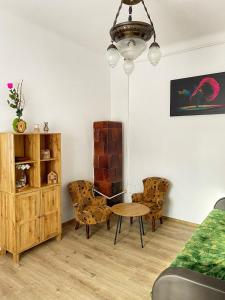 Khu vực ghế ngồi tại 4CENTER Apartments