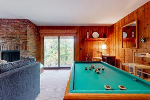 a living room with a pool table in it at Piper Ridge Unit B2 in Forest Farms