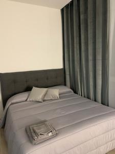 Postel nebo postele na pokoji v ubytování La perla sul Maggiore