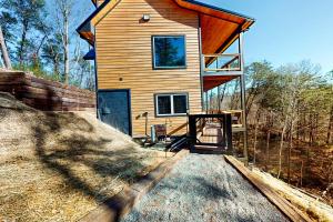 a house on a hill with its door open at Fiesta Hills Hideaway in Sevierville