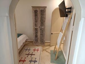 Postel nebo postele na pokoji v ubytování Riad KaBaYa Charme Exclusif Privatisé 2 à 8 Pers.