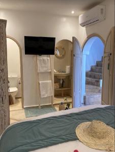 Llit o llits en una habitació de Riad KaBaYa Charme Exclusif Privatisé 2 à 8 Pers.