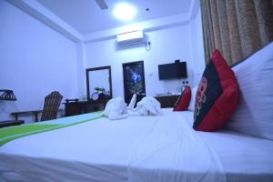 Letto o letti in una camera di VISU VILLA hotel
