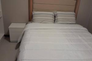 Postel nebo postele na pokoji v ubytování Departamento Premium