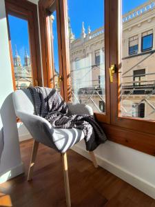 A seating area at El Mirador de Alfonso I by Alogest