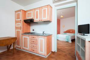 Kuchyň nebo kuchyňský kout v ubytování S'Incantu Resort