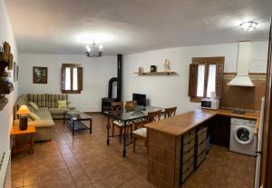 Χώρος καθιστικού στο Apartamentos Turísticos Rurales Dos Fuentes