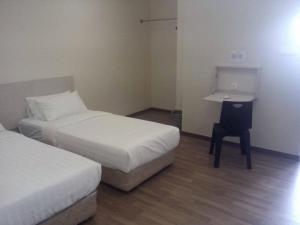 1ACS Residence客房内的一张或多张床位
