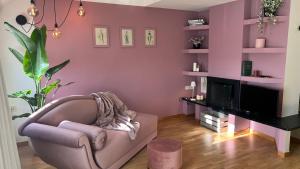 TV a/nebo společenská místnost v ubytování Atmosfere del Borgo - Bergamo