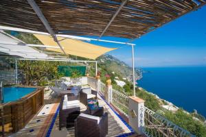 a balcony with a view of the ocean at Casa Marianna in Praiano