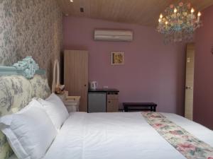 Letto o letti in una camera di 花蓮晨風星語民宿Sun Star B&B