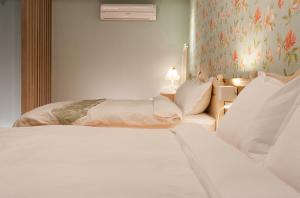 Letto o letti in una camera di 花蓮晨風星語民宿Sun Star B&B