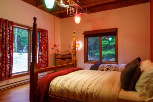 Katil atau katil-katil dalam bilik di La Romane Val-david Spa & Pool