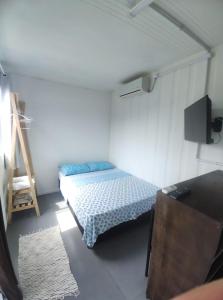 Postel nebo postele na pokoji v ubytování Pousada Beach Box