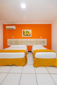 Postel nebo postele na pokoji v ubytování Hotel Adriattico