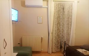 A television and/or entertainment centre at Agliata 138