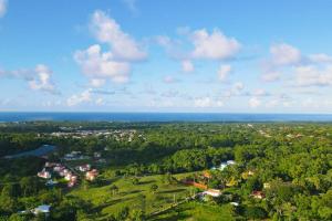an aerial view of a town and the ocean at Private Pool Villa - BBQ - Washer in Sosúa