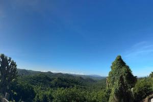 a view of a mountain with trees and a blue sky at Private Pool Villa - BBQ - Washer in Sosúa +26 photos