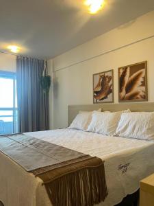 Cama o camas de una habitación en FLAT 508 PARTICULAR - HOTEL