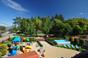 an aerial view of an amusement park with a playground at Pensjonat Relax in Mikołajki