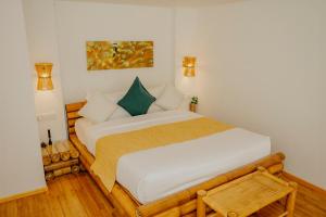Voodi või voodid majutusasutuse Ecoboo Maldives toas