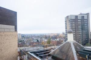 a building with a white tower on top of it at Homely Entire Apartment - Long Stay, Contractors - Central Location in Croydon