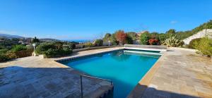 Gallery image of Villa de standing Les Amandiers, vue mer & piscine in Propriano