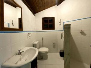 Ένα μπάνιο στο Casinha Jardim das Palmeiras +65 φωτογραφίες