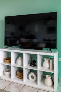 TV a/nebo společenská místnost v ubytování Fortuna Paradise