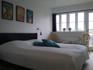 Postel nebo postele na pokoji v ubytování Hals Hotel