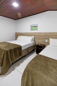 Cama ou camas em um quarto em Hotel Casa Blanca Porto Seguro mais 37 fotos
