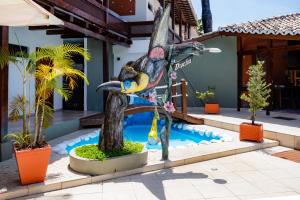 A piscina localizada em Hotel Casa Blanca Porto Seguro ou nos arredores