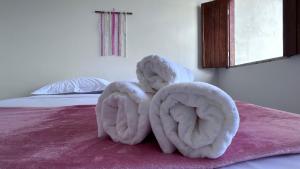 Cama ou camas em um quarto em Pousada Estrelar