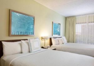 Postel nebo postele na pokoji v ubytování SpringHill Suites Austin South