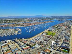 an aerial view of a harbor with boats in the water at Steps from the Sand-Rooftop Spa-Incredible Views in Newport Beach