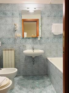 Koupelna v ubytování Hotel Vico Alto Siena