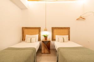 A bed or beds in a room at Lazcano & old town by ELE Apartments