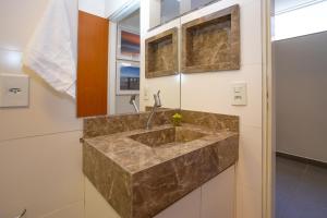 a kitchen with a large marble sink in it at Botanical House, bairro Jardim Botânico 3 de Bsb in Brasilia +18 photos
