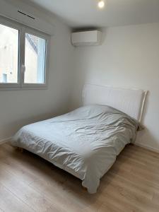 Cama o camas de una habitación en Appartement Duplex - 3 Chambres