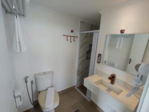 Um banheiro em Grand Hotel Guarujá - A sua Melhor Experiência Beira Mar na Praia!