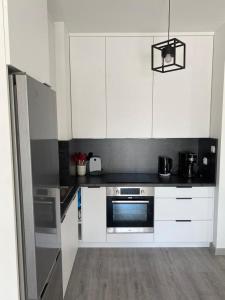 Η κουζίνα ή μικρή κουζίνα στο Apartament 33 Nad Iławką