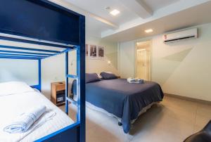 Postel nebo postele na pokoji v ubytování El Misti Hostel Ipanema