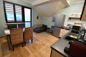 Dapur atau dapur kecil di Kordeczki-Apartamenty i pokoje