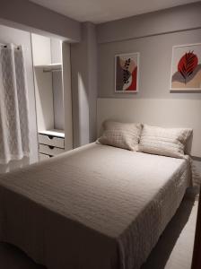Katil atau katil-katil dalam bilik di Sol Marina Loft
