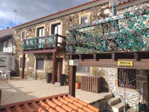 O edifcio onde a casa de hspedes est situado