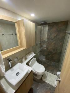 Koupelna v ubytování Hermoso, moderno y confortable apartamento.