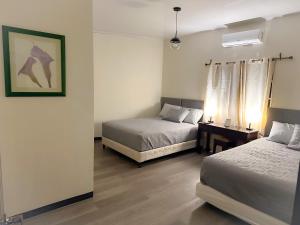 Voodi või voodid majutusasutuse Helechos Hotel toas