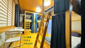 Postel nebo postele na pokoji v ubytování Hotel Adonis Tokyo - Dormitory Share Room For Male Only At City Center