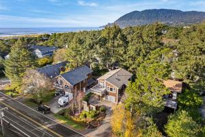 an aerial view of a house with a mountain at Sand Bucket in Manzanita